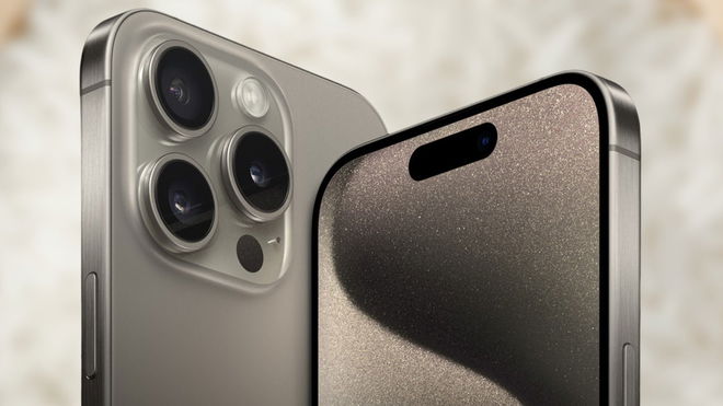 iPhone 15 Pro Max in front of a blurred image of rice