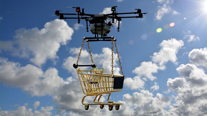 Delivery drone carrying shopping cart.