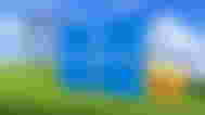 Windows 10 logo in front of the classic hill wallpaper, emoji and timer vector