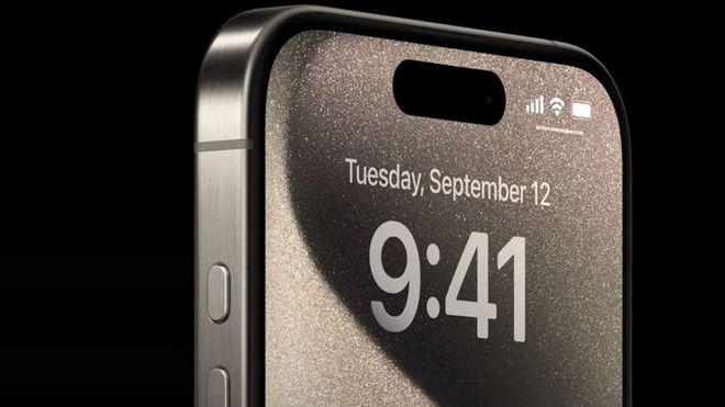 iPhone 15 with the new Action Button at the side and the lock screen on view