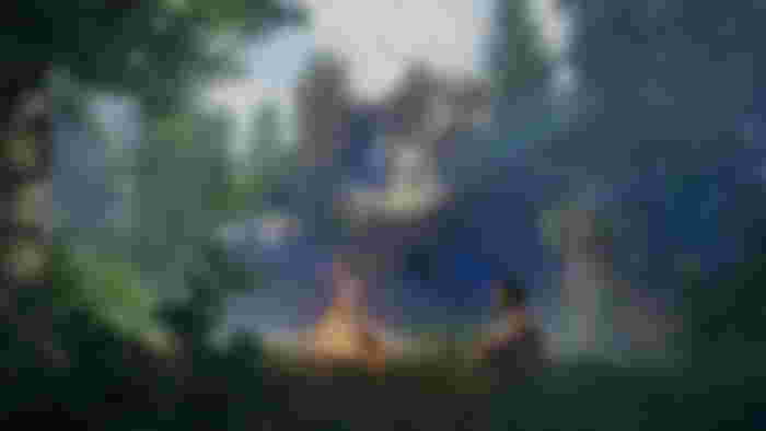Clay - player sits in front of a campfire