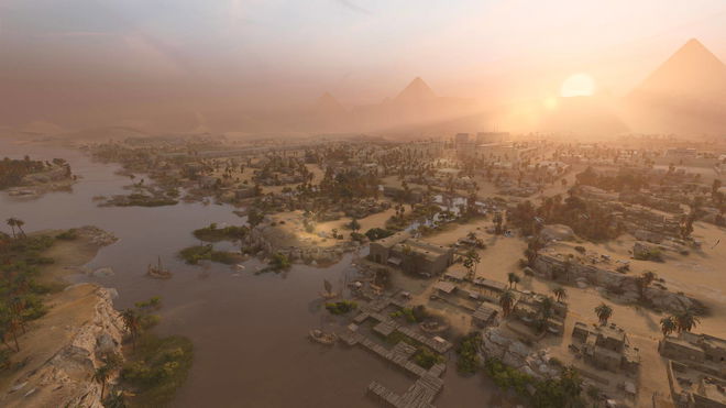 A desert as the sun sets in Total War: Pharaoh.
