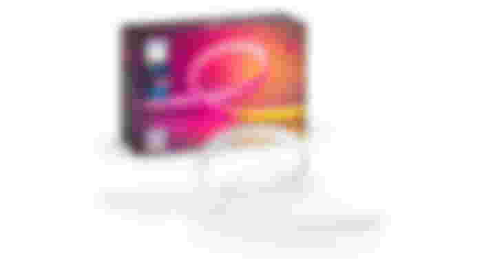 Philips Hue Gradient Smart Lightstrip product image of a white smart light strip next to their box featuring an image of the lights in pink and orange on it.