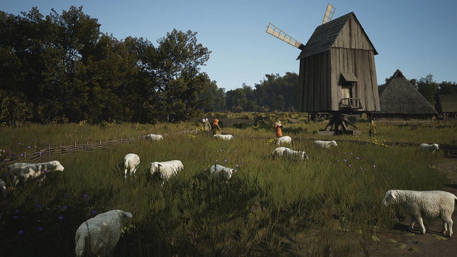 Manor Lords first-person: A scenic shot of a farm, featuring several sheep and villagers, with a large mill in the background.