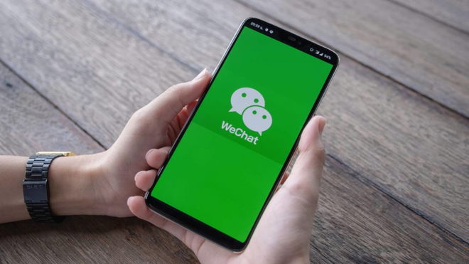 A phone user on the WeChat app.