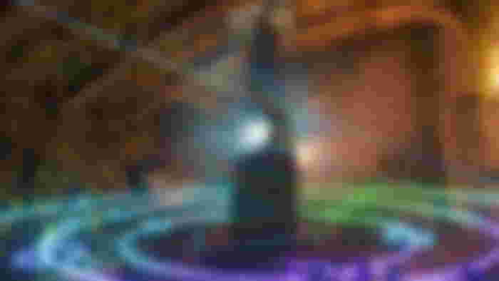 A large stone illuminating a room from a central point, with three rings around it that are green, blue, and purple in Blade and Sorcery