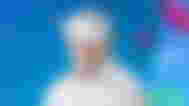 Hide the Pain Harold from stock images wearing a PSVR 2 headset in front of the Days of Play wallpaper
