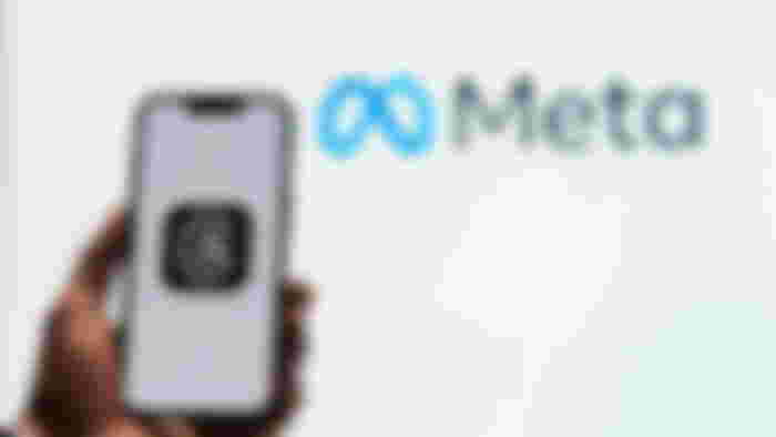Man using new meta threads app on smartphone.