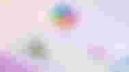 Microsoft's Copilot logo above some open apps in a press image