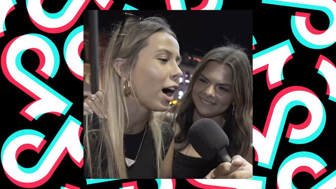 An image of the viral “Hawk Tuah” girl speaking into a microphone