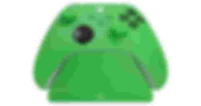 Razer Universal Quick Charging Stand product image of a green Xbox controller placed on a green charging stand.