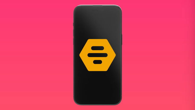 iPhone 15 Pro Max in front of a bright background with a Bumble logo 