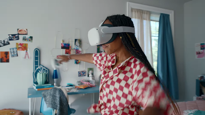 Woman playing beat saber on the Quest 3.