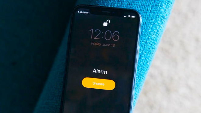 An image of an iPhone alarm go off during a call