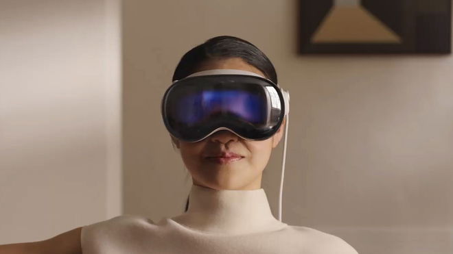 Person wearing Apple Vision Pro headset