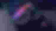 Threads typed out multiple times of a smartphone, with one line highlighted in the Instagram logo's colors.