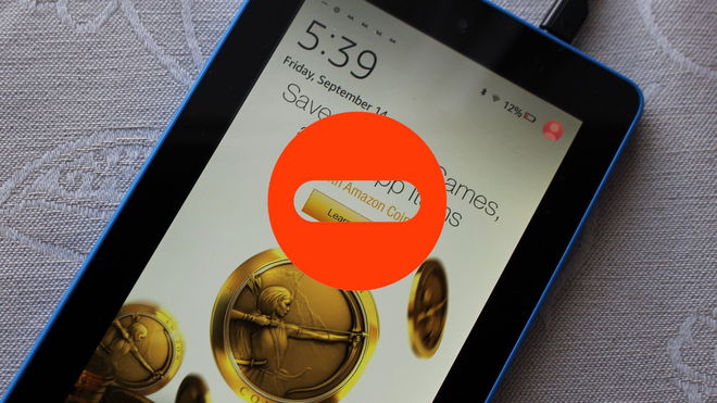 A Kindle displaying an advertisement for Amazon Coins and a large red prohibition sign over the ad, indicating a way to remove ads for free.