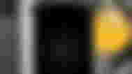 iPhone Face ID set up screen in front of an iPhone 15 line up and a thinking emoji