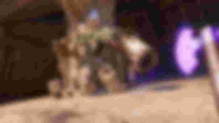 POV of someone holding a Gravity-imbued purple axe while looking at the Golem from Blade and Sorcery