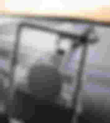 A black and cleat tablet mount attached to a dashboard.