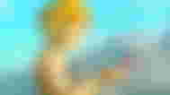 Zelda holding the Yuzu logo in Tears of the Kingdom