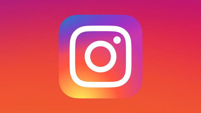 The Instagram logo in front of a gradient background similar to the logo's assortment of colors