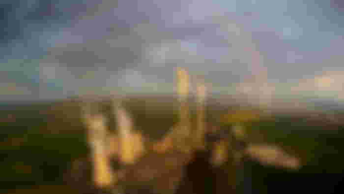 Power plant, chimney, rainbow