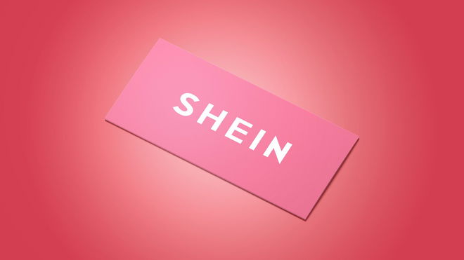 a pink business card with the word shein written on it .