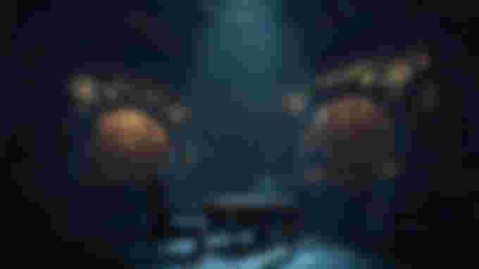 Light shines down onto a table in an otherwise dark room in Firmament - upcoming VR games