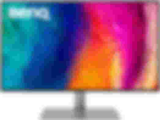 BenQ PD3220U product image of a dark grey monitor turquoise, blue, orange, and pink pattern on the display.