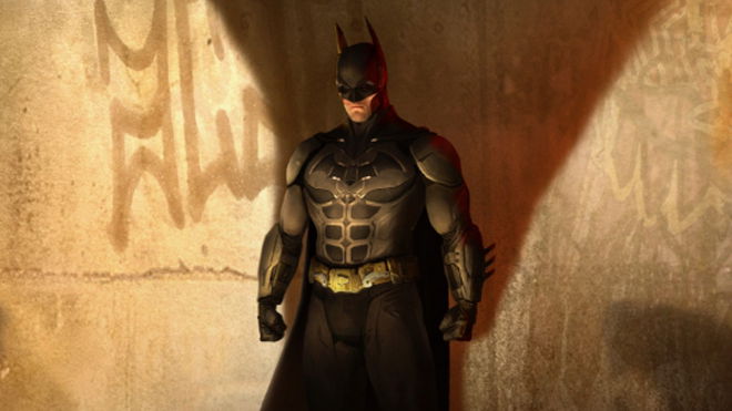 Batman standing in front of a wall with a shadow from him in Arkham Shadow key art