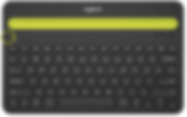 Logitech K480 product image of a compact, black keyboard with a light green trim.