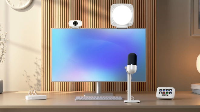 Monitor surrounded by Elgato Neo microphone, Stream Deck, Webcam, Capture, and Light 