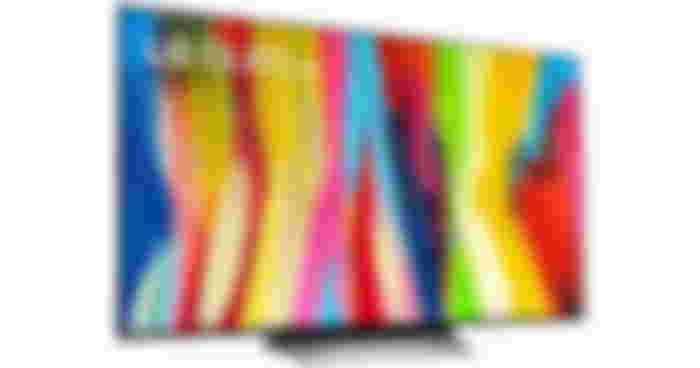 LG OLED65C2 product image of a grey and black near-frameless TV with multicoloured paint streaks on the display.