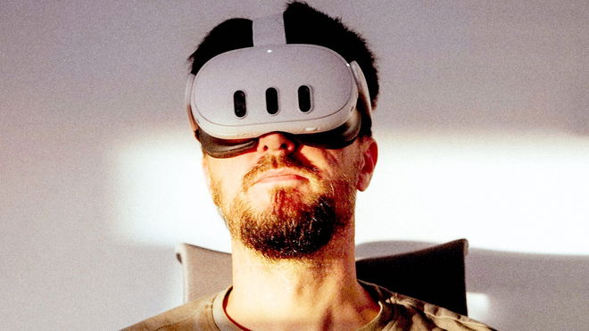 A grumpy man with a drowsy face wearing a meta quest 3 vr headset 