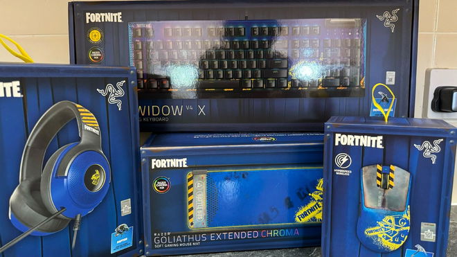 A bundle of Razer Fortnite products in front of a tiled wall and on a marble countertop