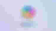 Microsoft Copilot logo and text in front of a purple-blue background