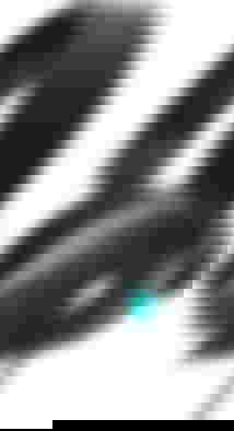 Alienware AW520H product image of a black over-ear headset with an Alien head lit up in blue on the side.