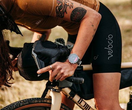 Suunto 9 Peak watch on a cyclist's wrist - Suunto 9 Peak Pro