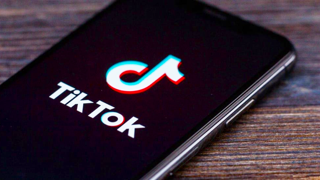 How to turn off invites on TikTok - An image of the TikTok app loading screen