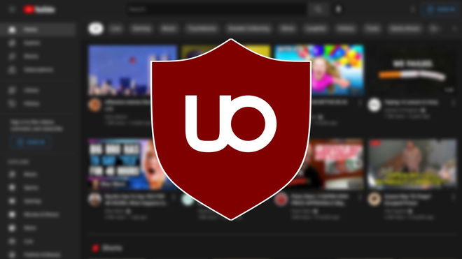 An image of the uBlock logo in the background of YouTube's home screen