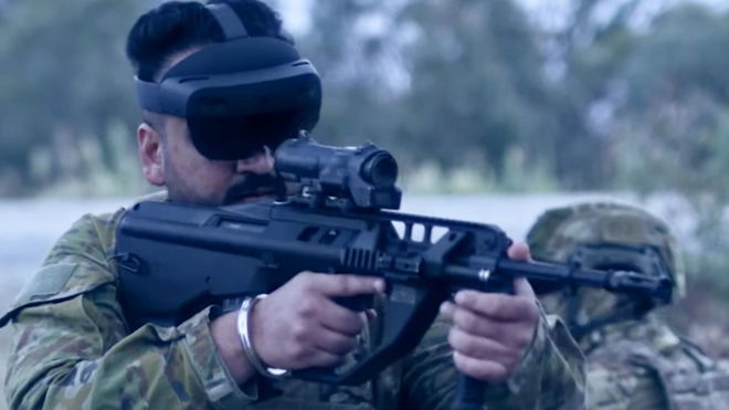 Soldiers mind-control robot dogs with headsets in army video 