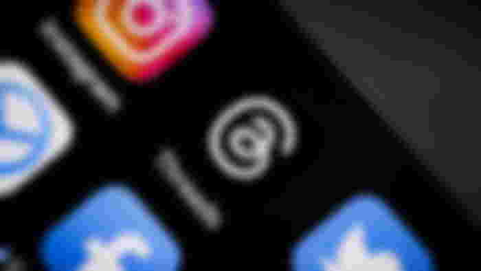 Threads logo by Instagram and Meta