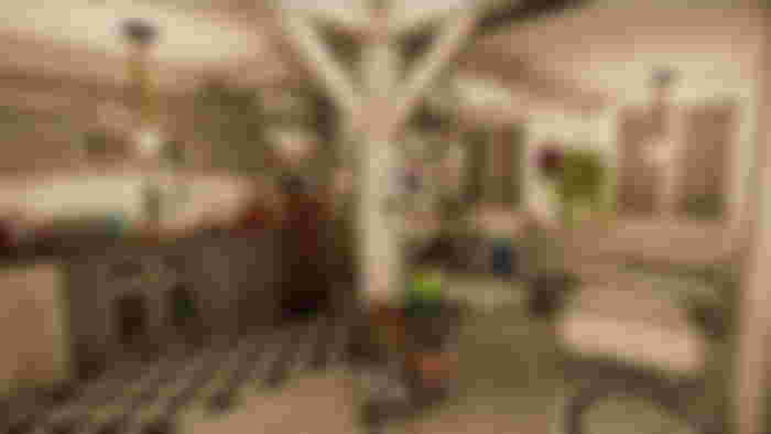 House Flipper 2 - interior of a house with exposed wooden beams