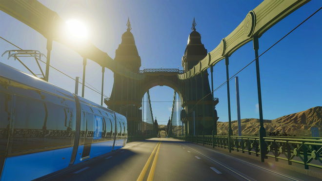 Cities Skylines 2 - tram crossing a bridge with the sun shining overhead
