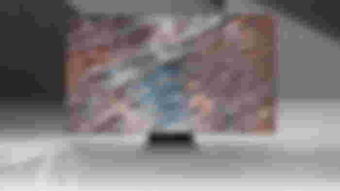 Image of a large flatscreen TV featuring water rippling on the display.