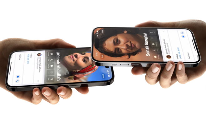 turn off NameDrop on iPhone - An image of two iPhones sharing contacts via NameDrop