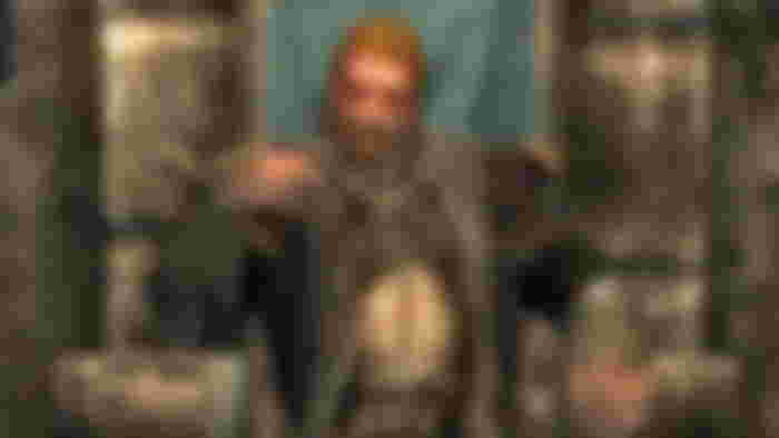 An image of Ulfric Stormcloak sat on a throne in Skyrim