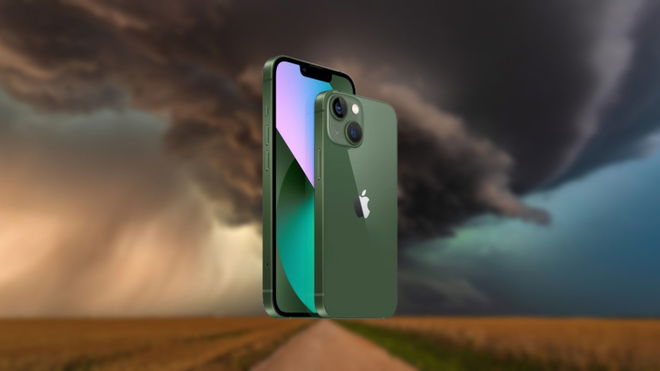 An image of an iPhone and a tornado forming in the background - turn on weather alerts