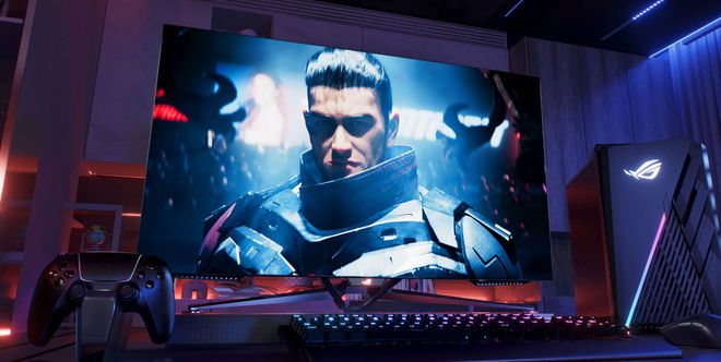 Image of an OLED monitor featuring a video game character in armour on the display.